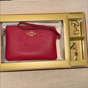 COACH RED WRISTLET WITH CHANGEABLE CHARMS!